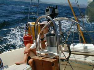 Kendra at helm in Mexico aboard "Marta" in 1998